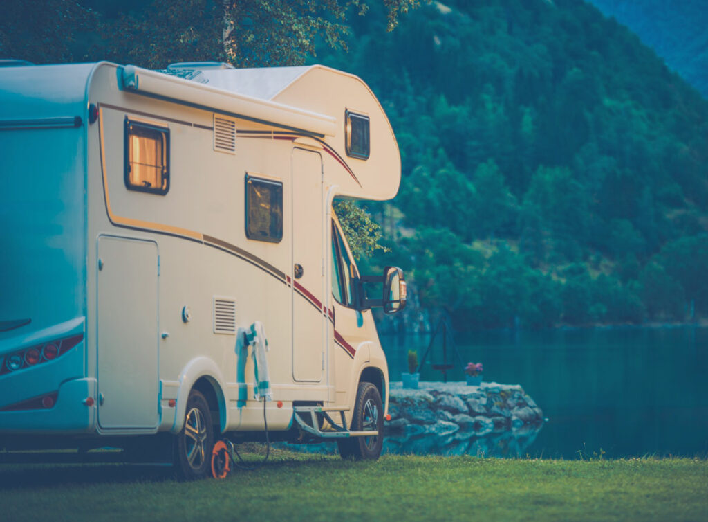 Photo of an RV in nature.